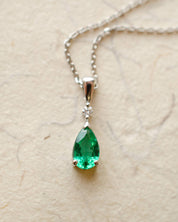 Platinum diamond and pear cut emerald necklace