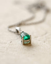 Platinum diamond and pear cut emerald necklace