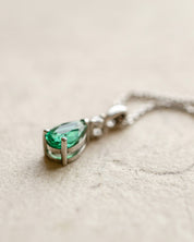 Platinum diamond and pear cut emerald necklace
