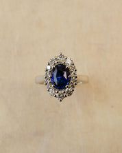Platinum blue sapphire cluster style ring with white diamonds