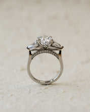 platinum trilogy ring with oval and pear lab-grown diamonds