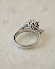 platinum trilogy ring with oval and pear lab-grown diamonds