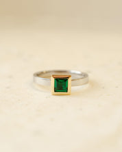 platinum and 18ct yellow gold ring with princess cut emerald