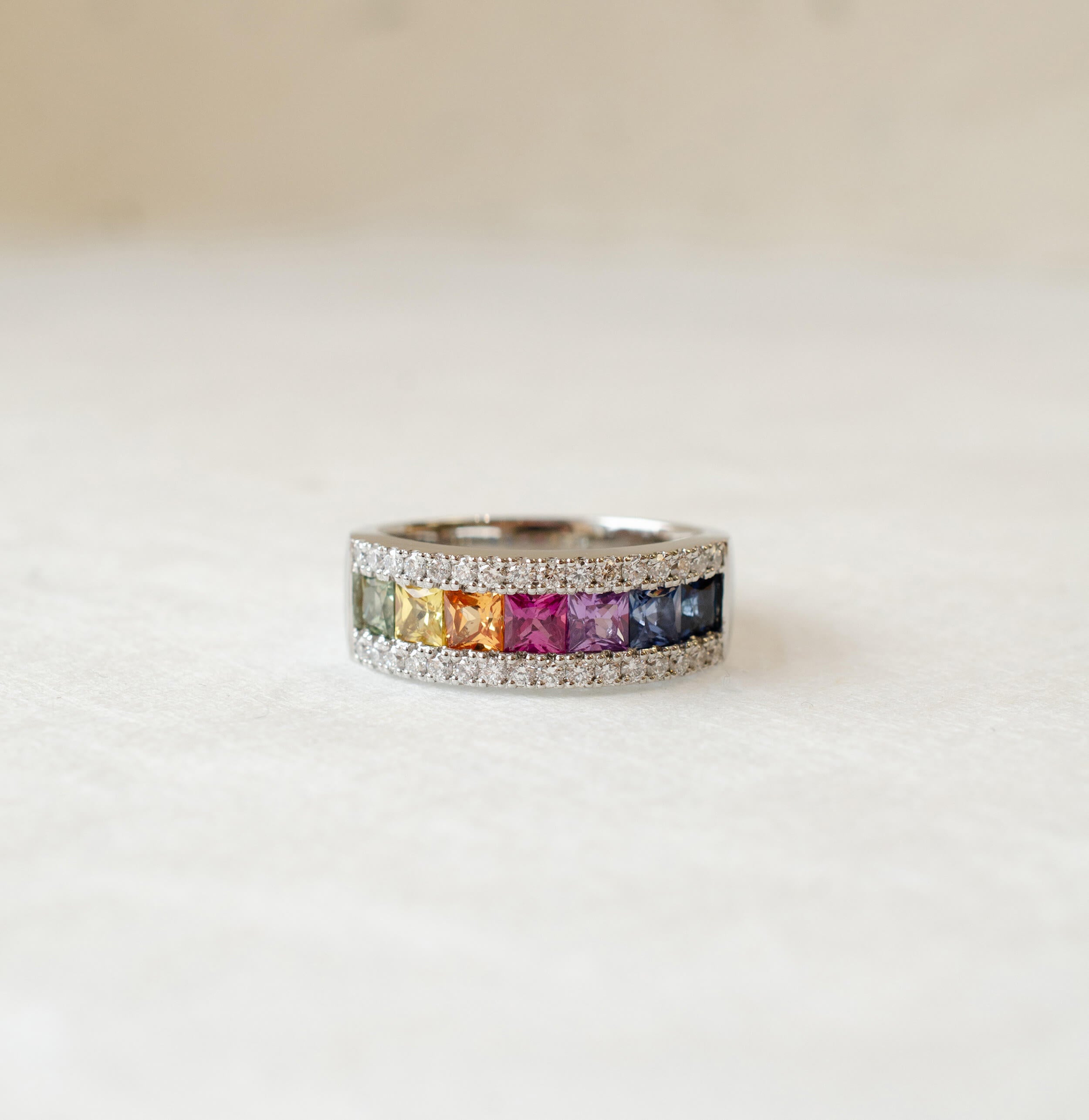 platinum, diamond and sapphire rainbow wedding ring