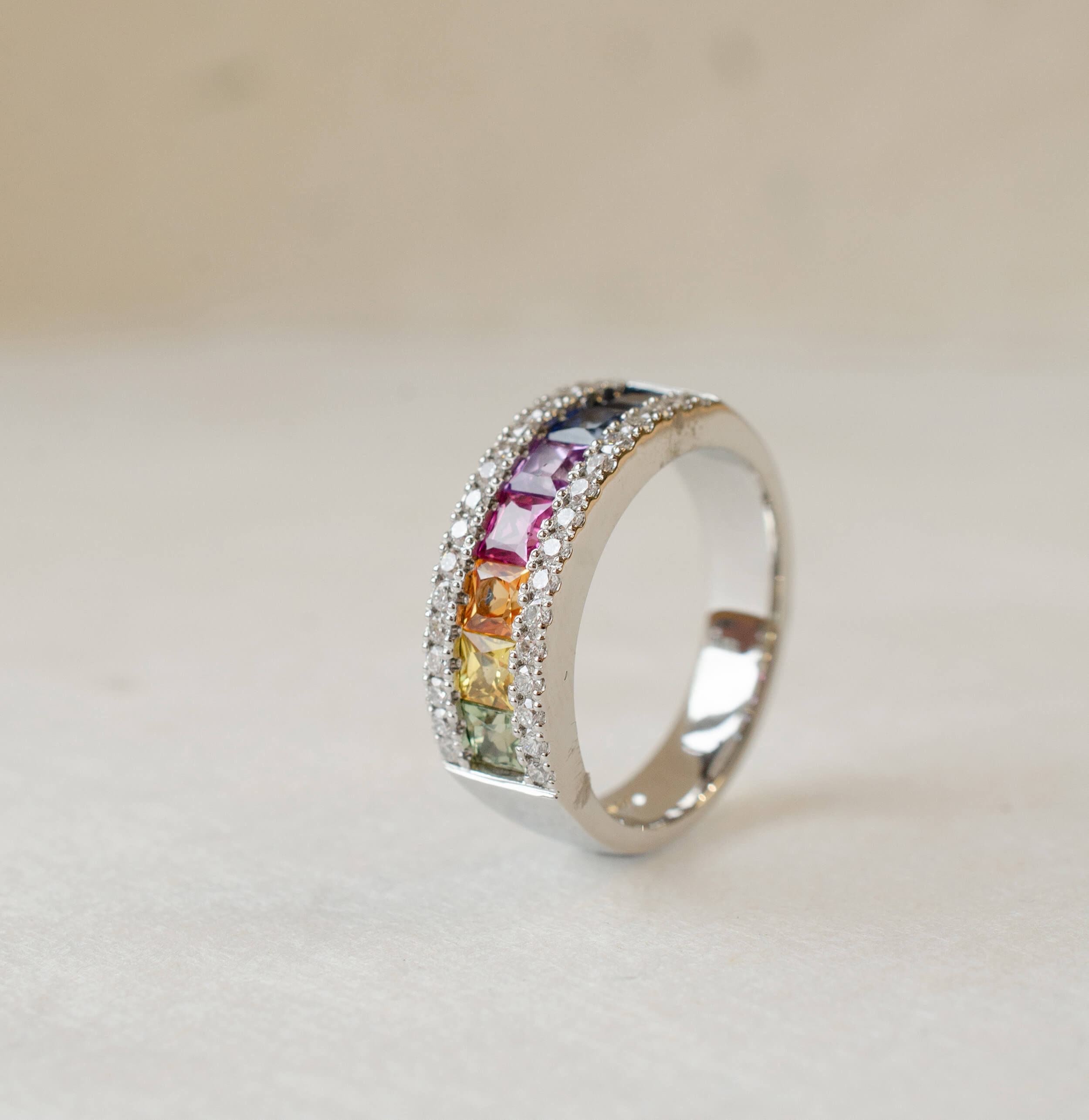 platinum and diamond rainbow sapphire ring