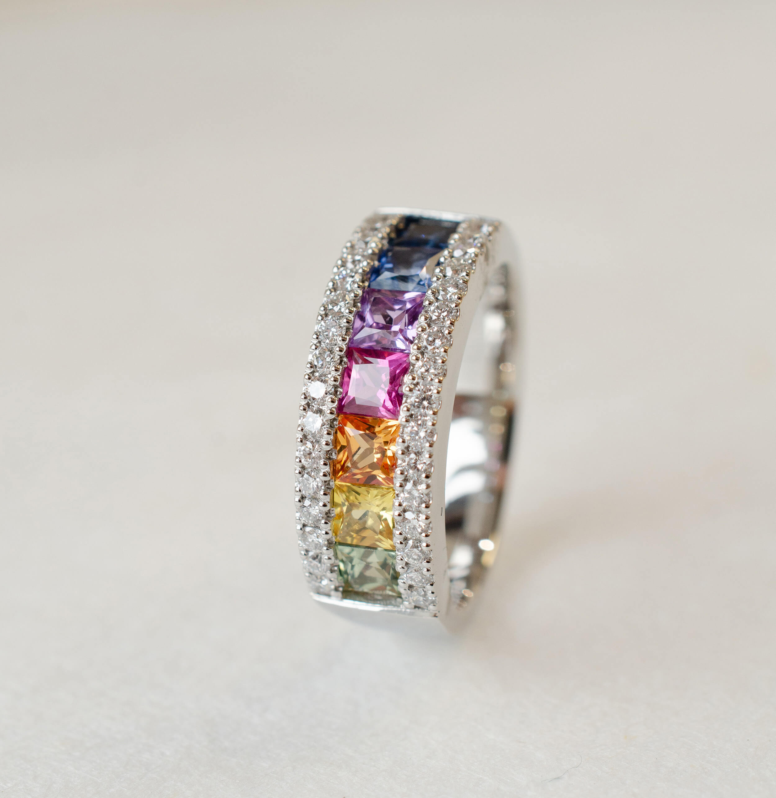 rainbow sapphire and diamond eternity ring