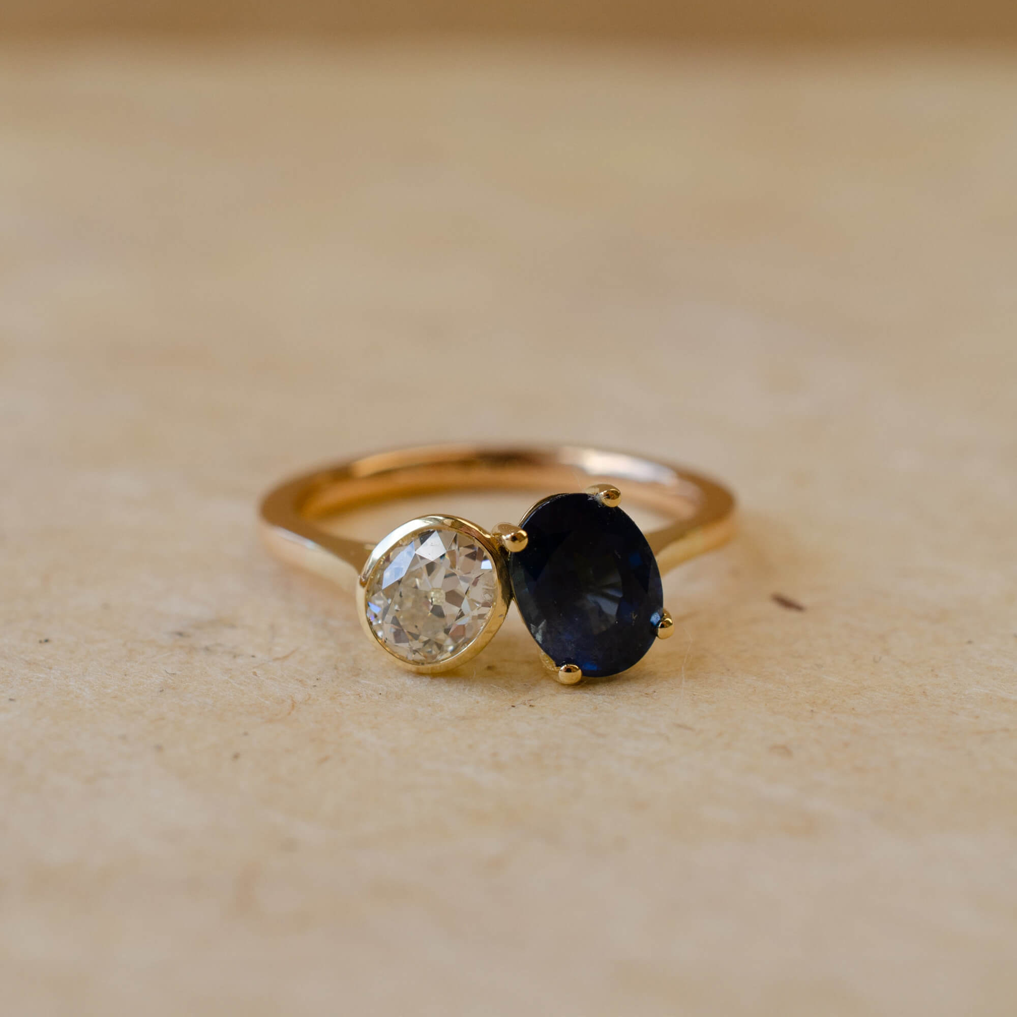 yellow gold diamond and sapphire two stone ring