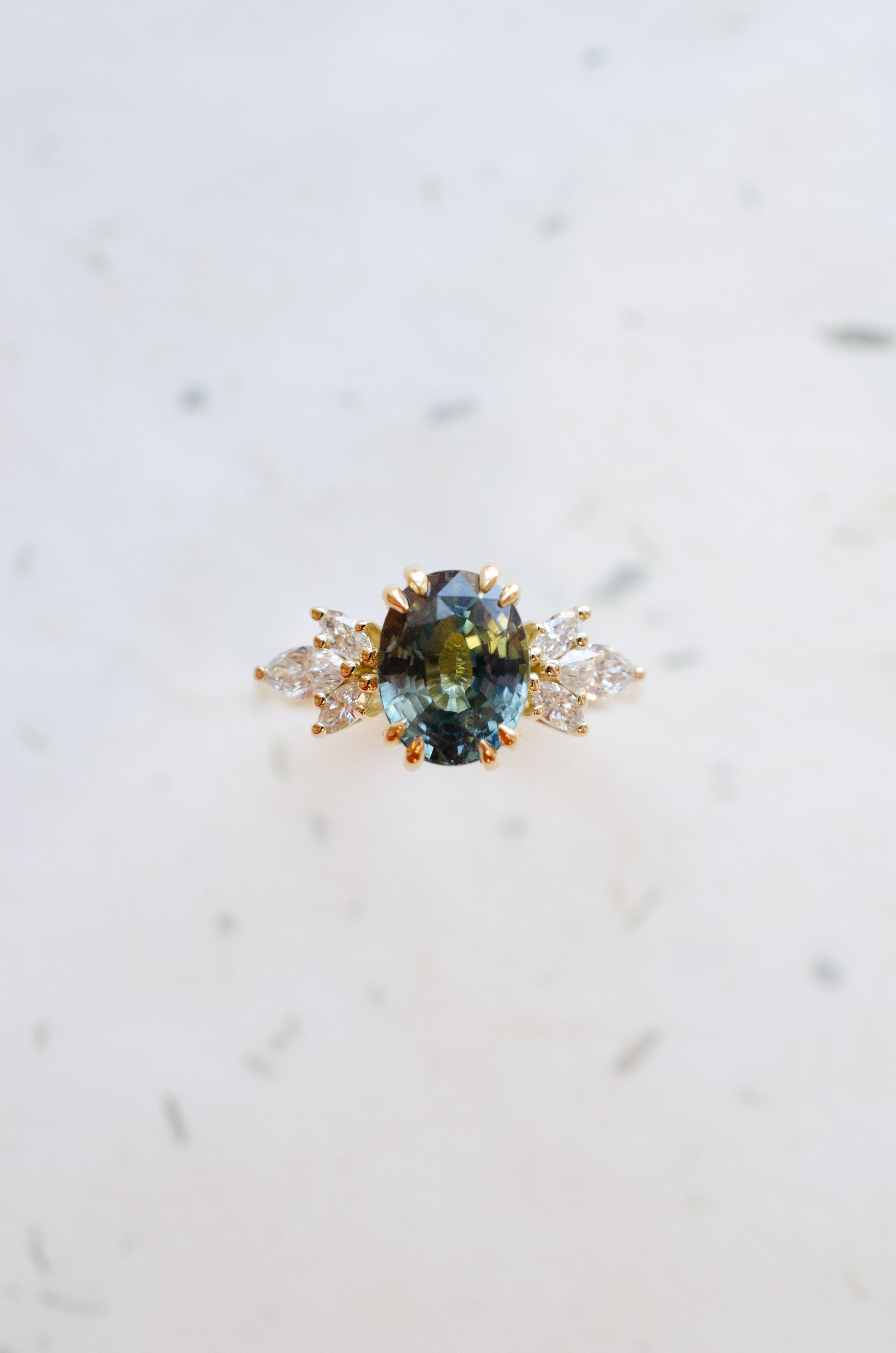 teal sapphire oval engagement ring 18ct yellow gold