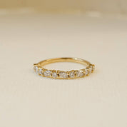 18ct yellow gold alternating round and marquise eternity ring