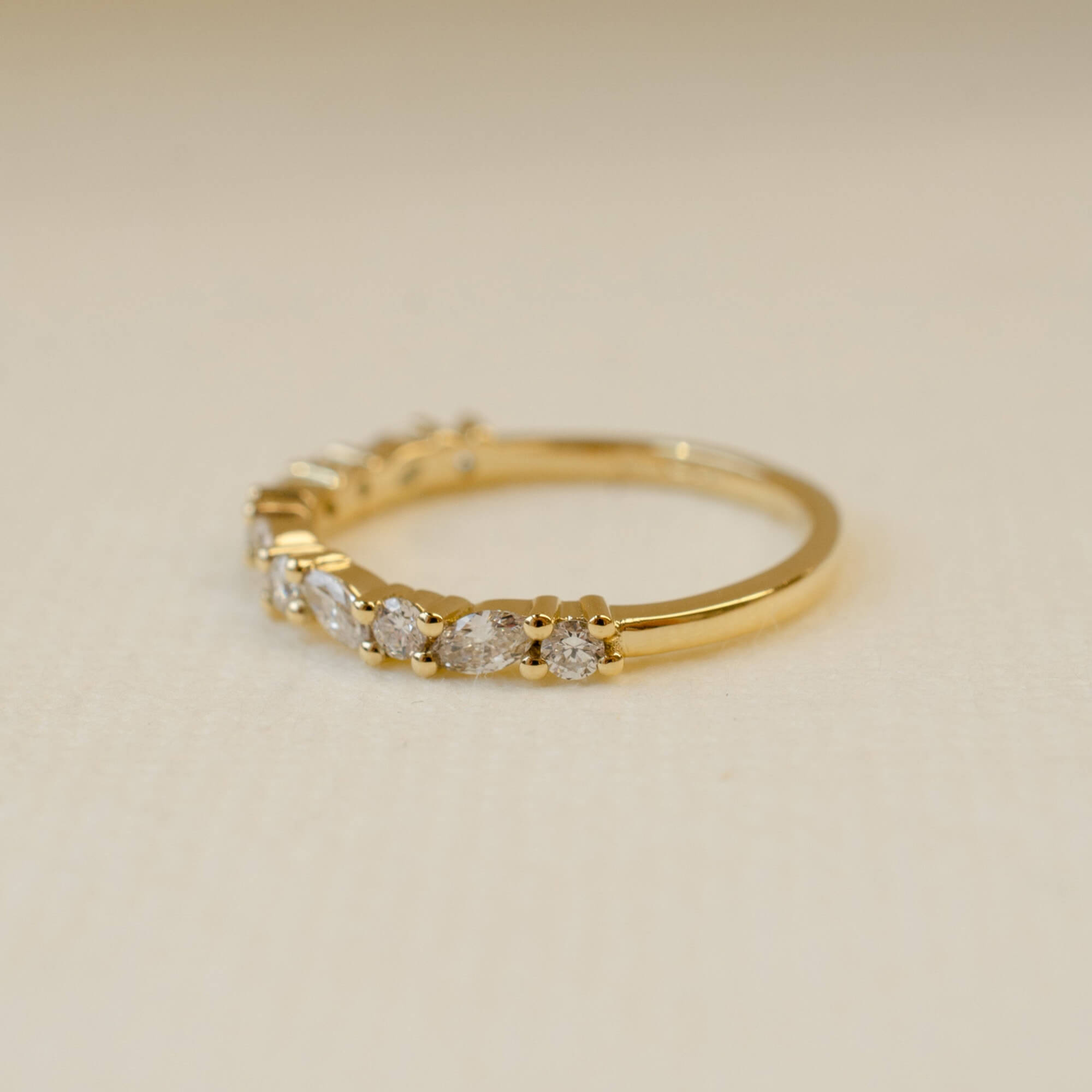 yellow gold marquise and round cut diamond wedding ring