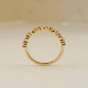 wedding ring in 18ct yellow gold with round and marquise white diamonds 