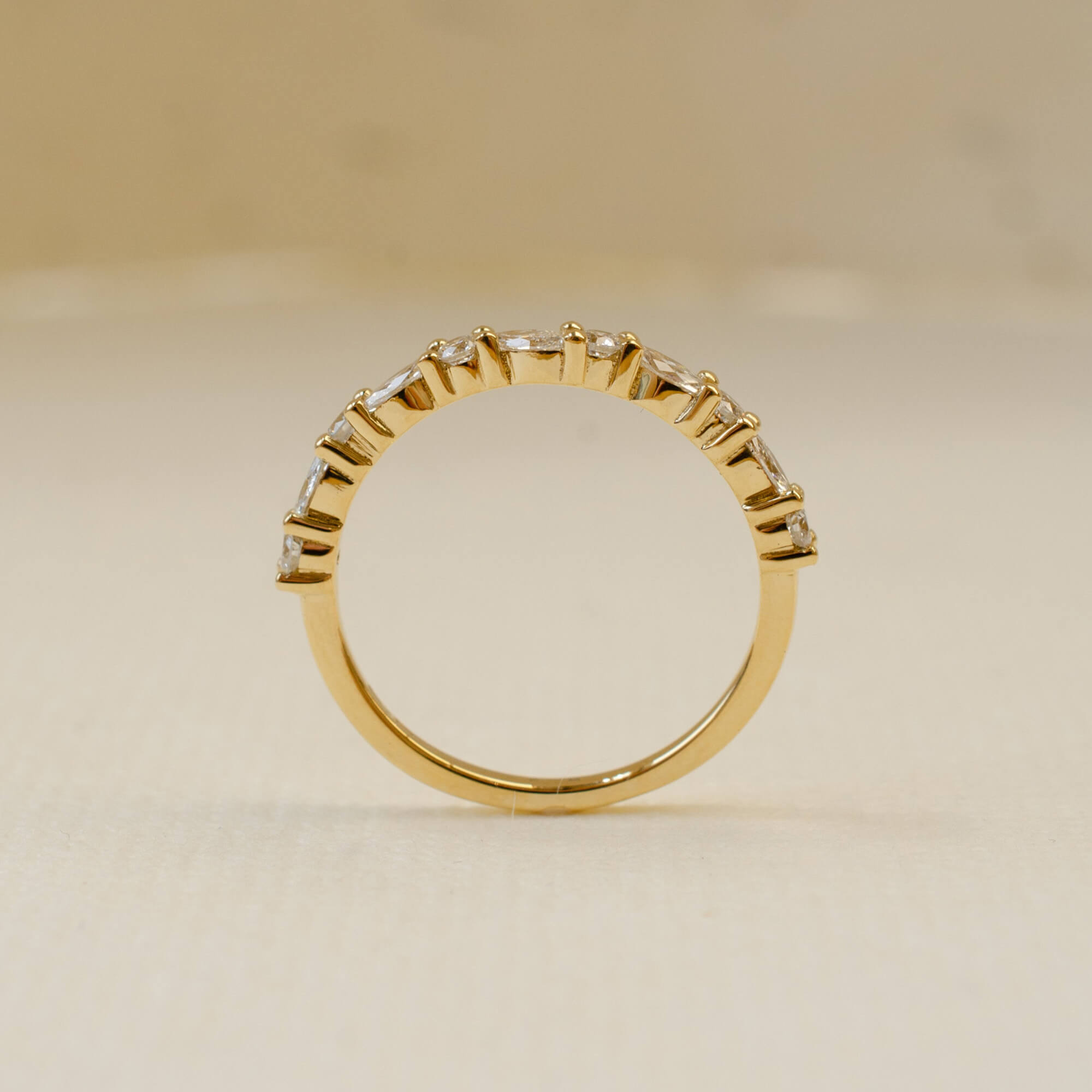 wedding ring in 18ct yellow gold with round and marquise white diamonds 