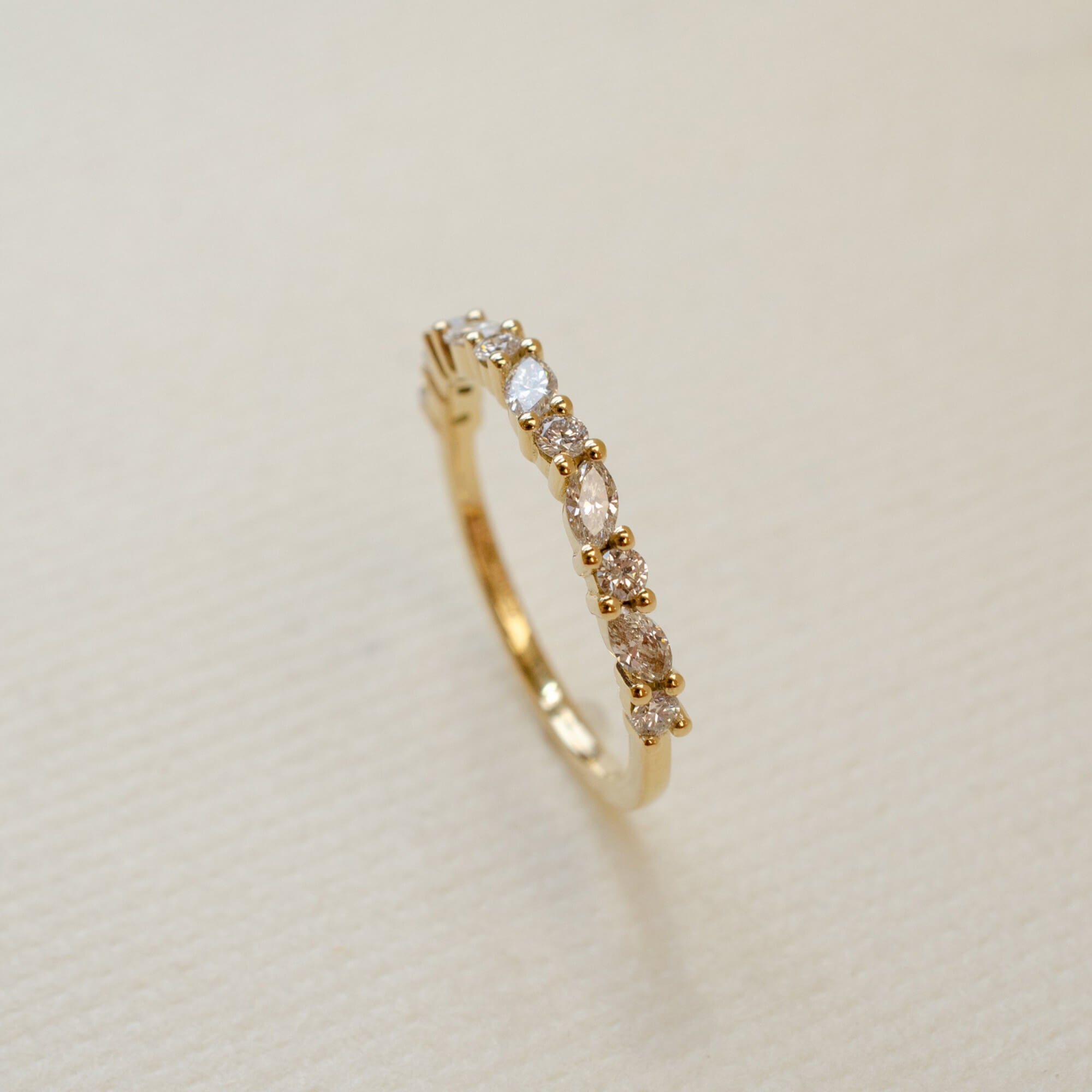 18ct yellow gold alternating round and marquise wedding ring