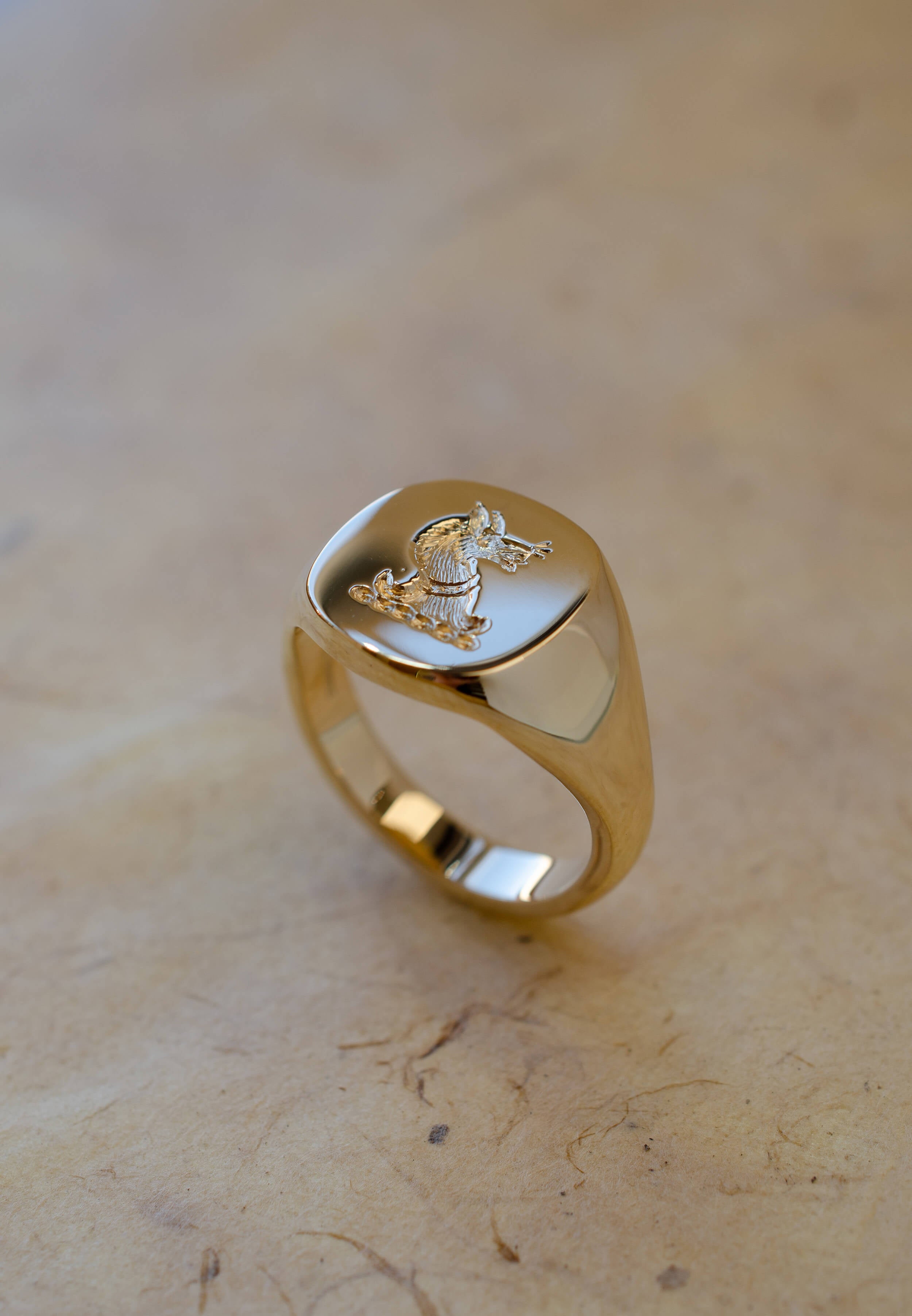 seal engraved cushion shape signet ring in yellow gold