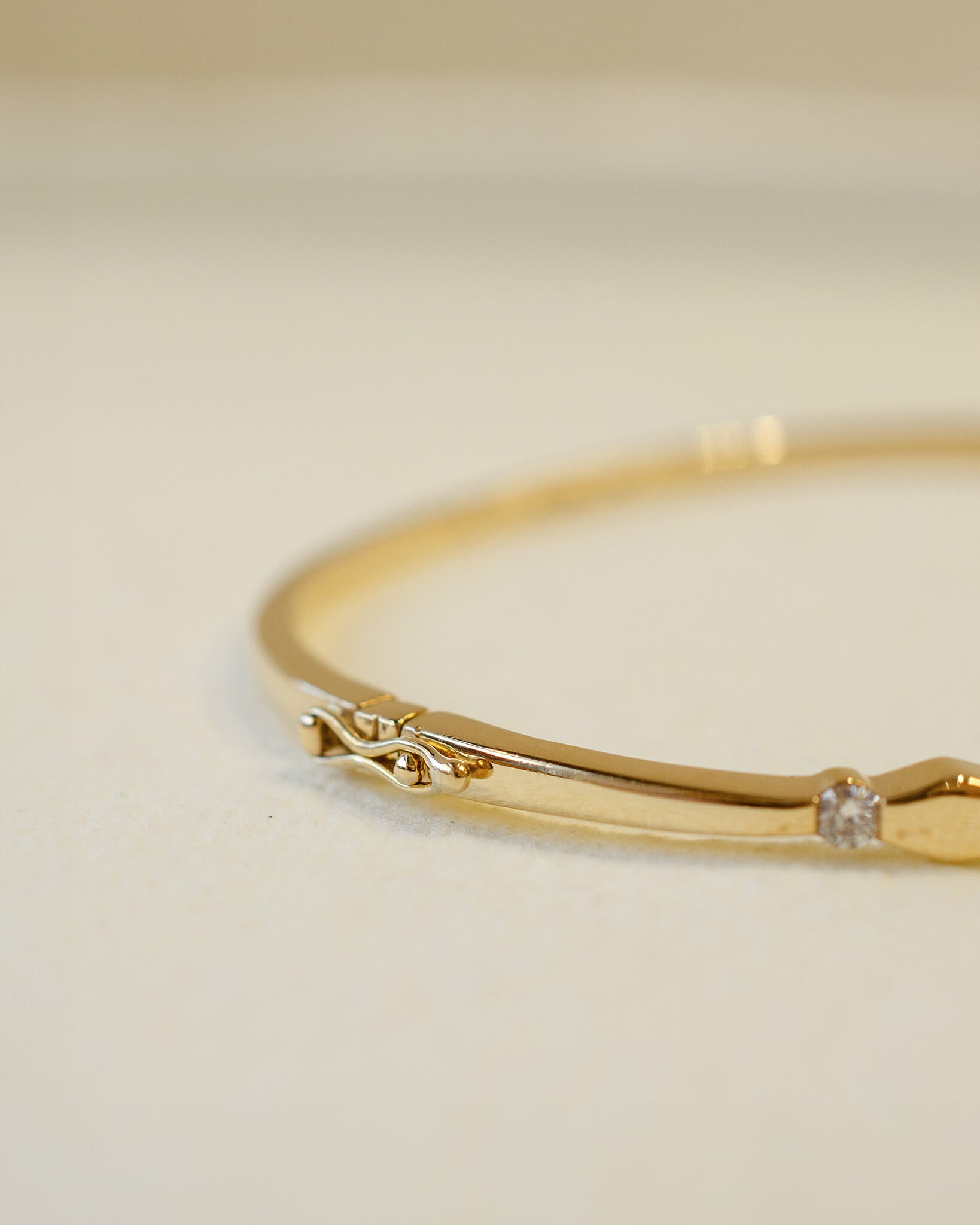 yellow gold hinged bangle with diamonds 