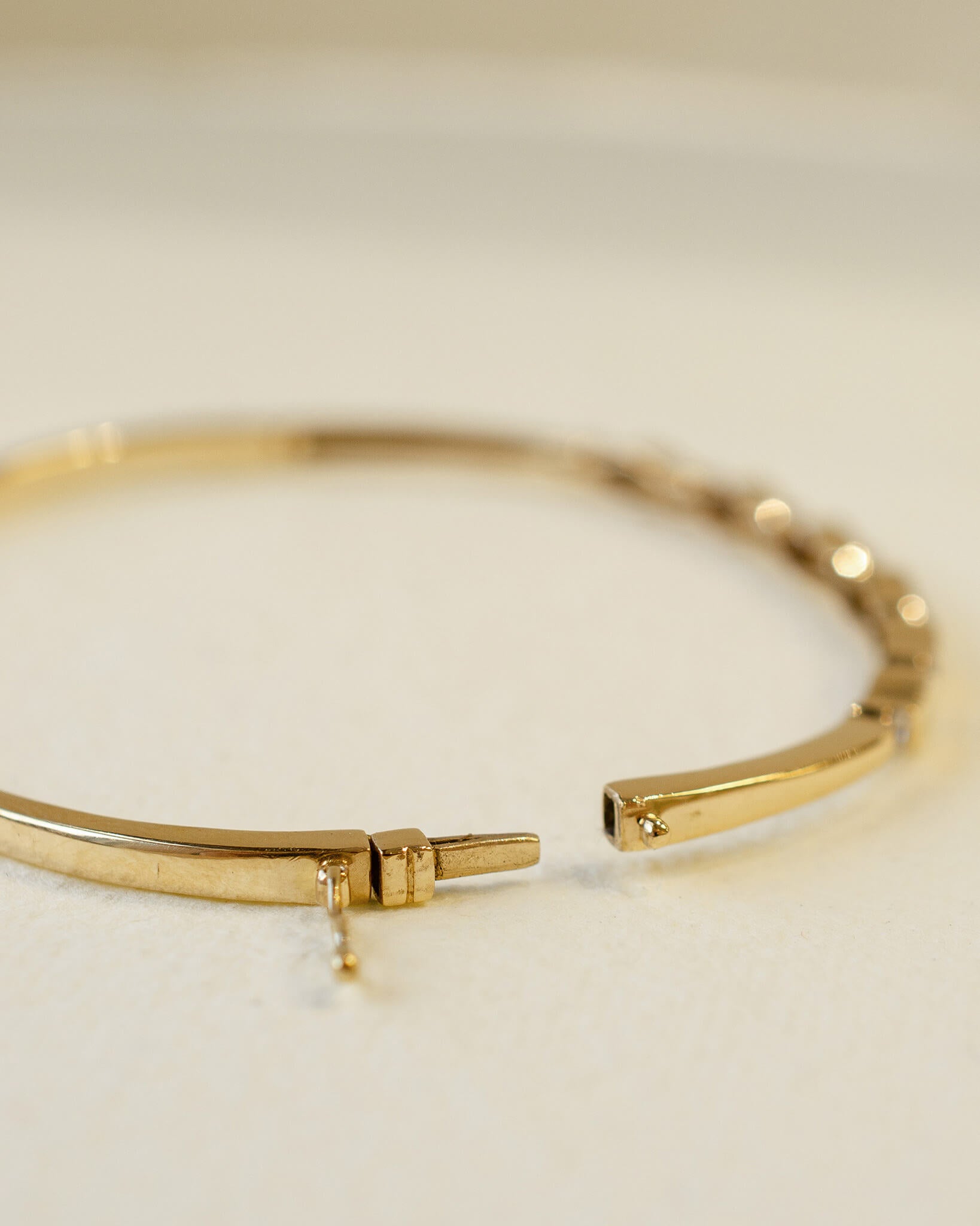 yellow gold hinged bangle with diamonds 