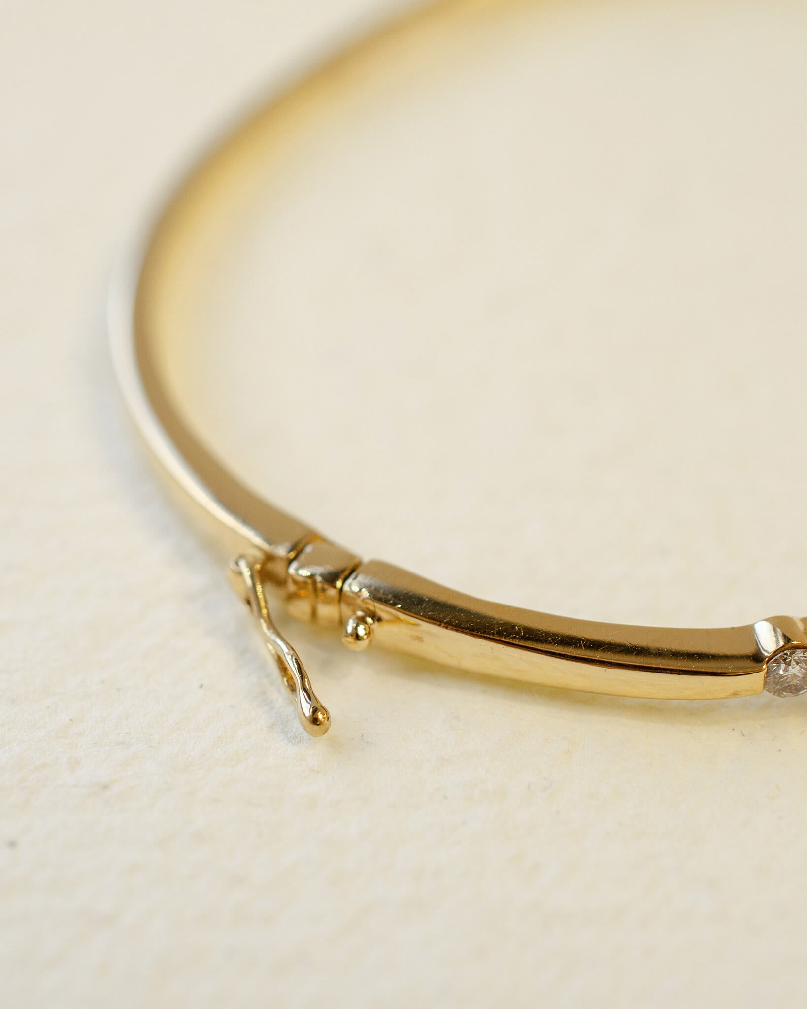 yellow gold hinged bangle with diamonds 