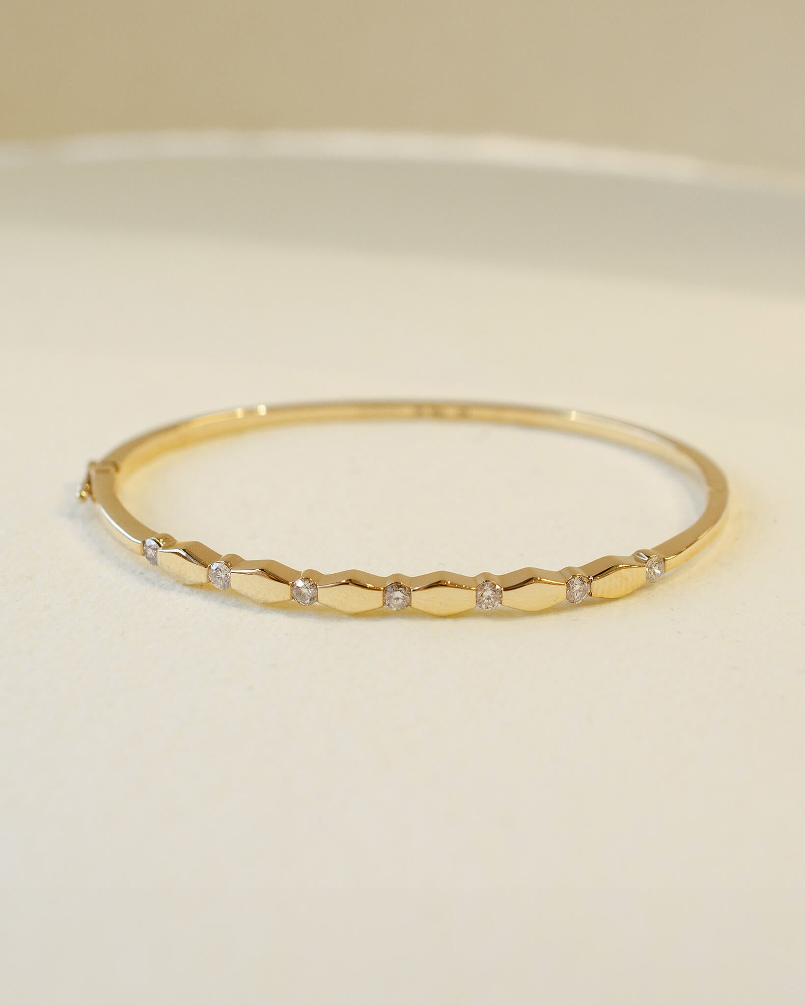 yellow gold hinged bangle with diamonds 