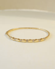yellow gold hinged bangle with diamonds 