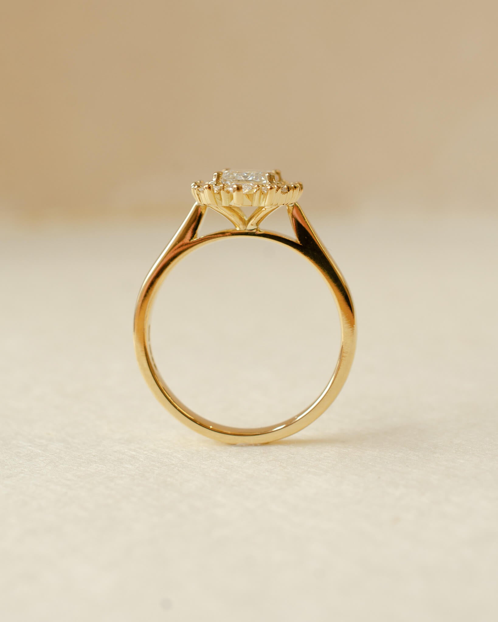 yellow gold and diamond emerald cluster engagement ring