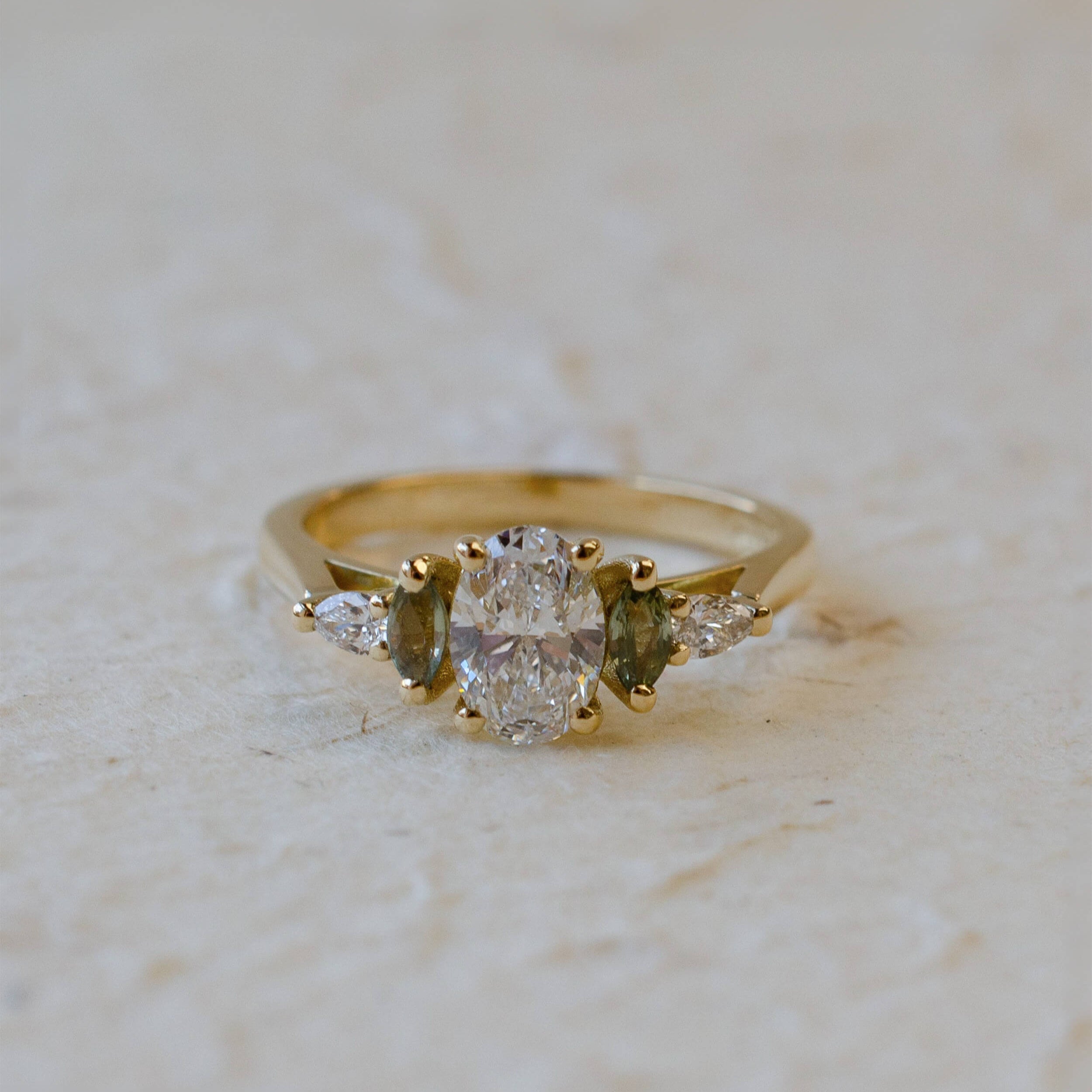 diamond and green sapphire engagement ring 