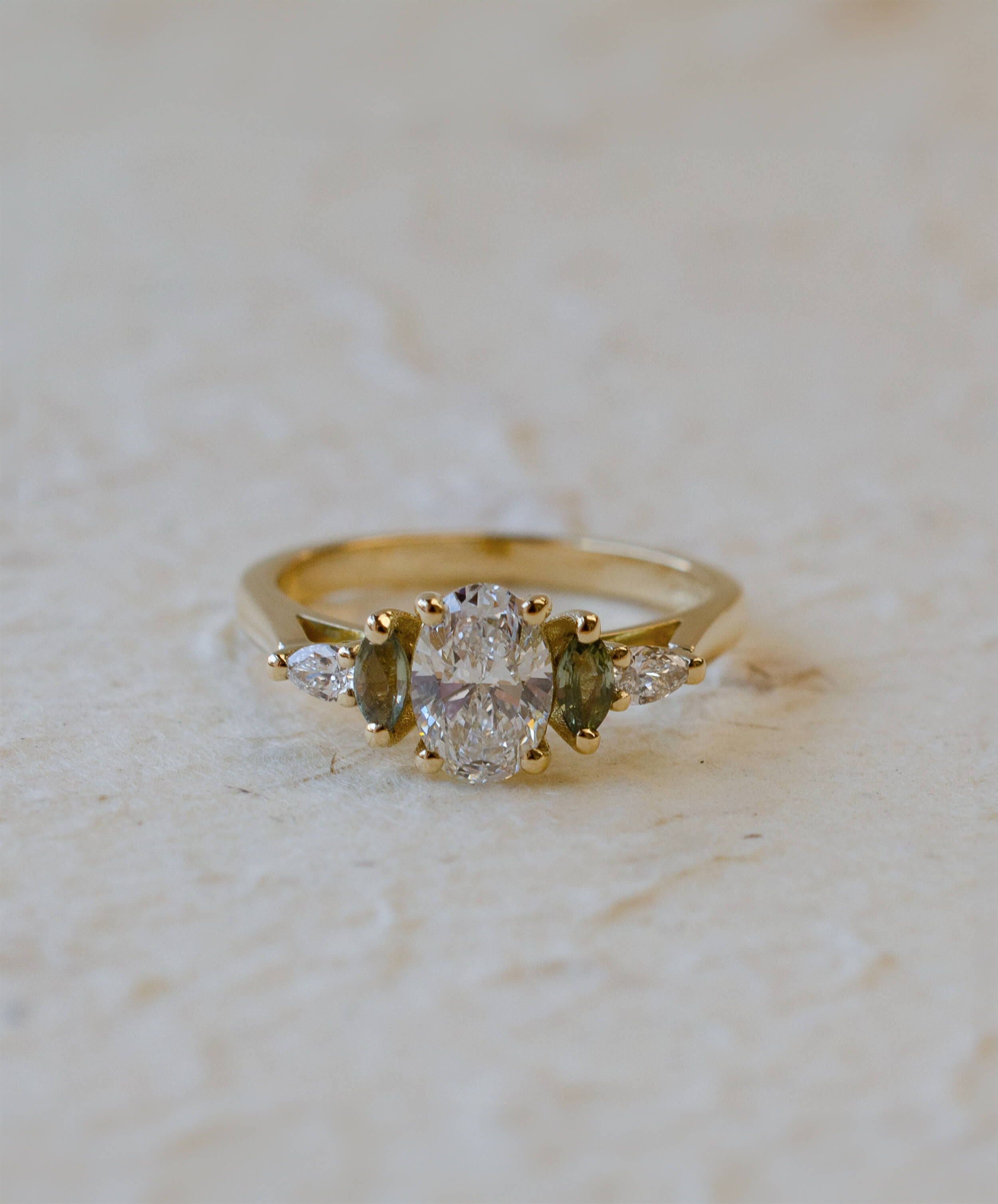 diamond and green sapphire engagement ring 