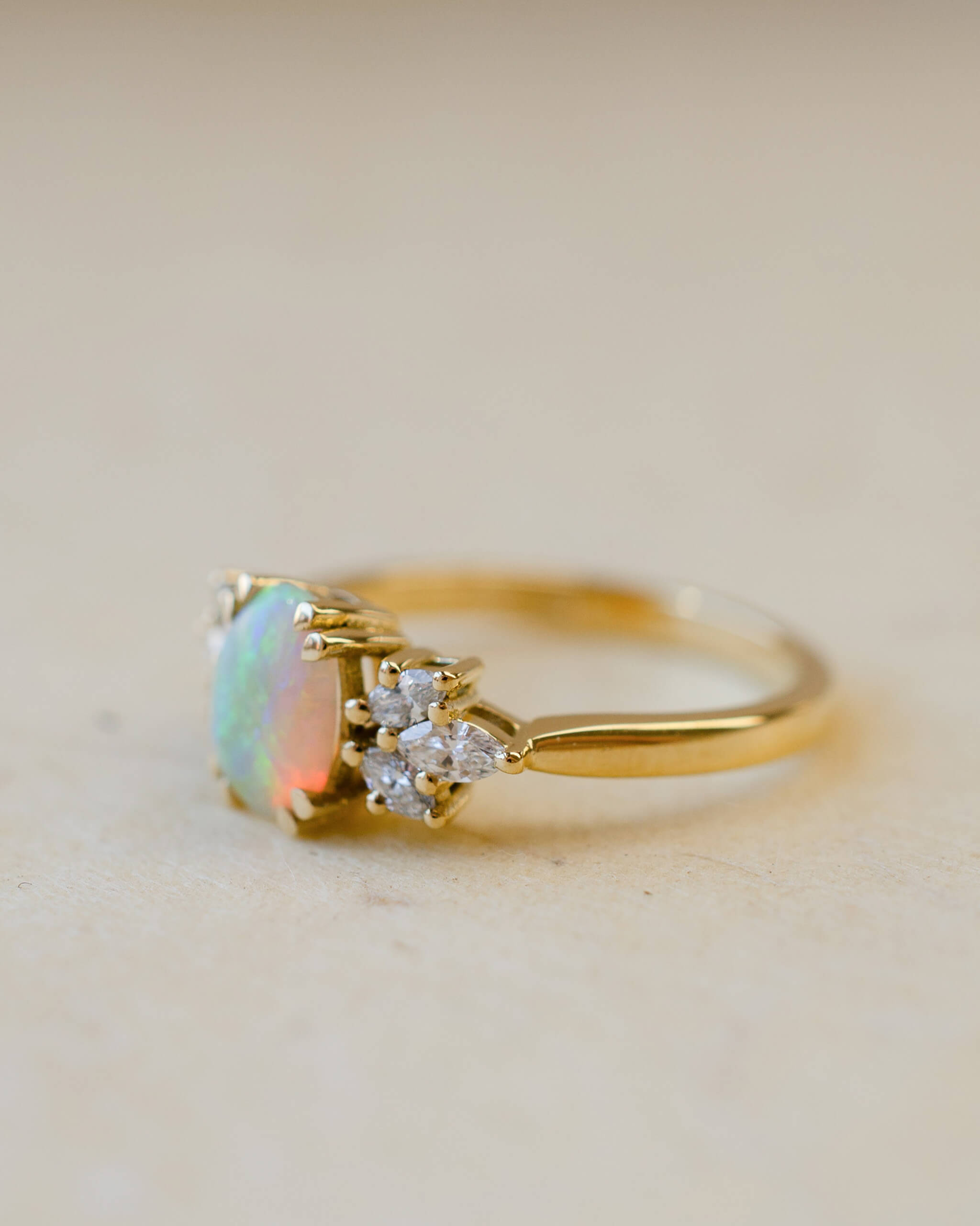 18ct yellow gold opal ring with diamond leaves